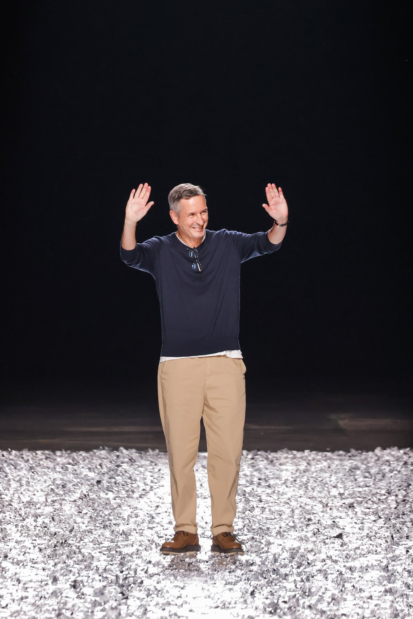 Dries Van Noten waves goodbye at his final show.