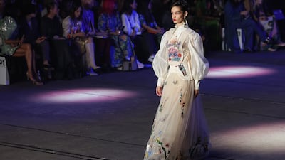 A model walks the runway during the Alemais 2023 runway show at Australia Fashion Week.