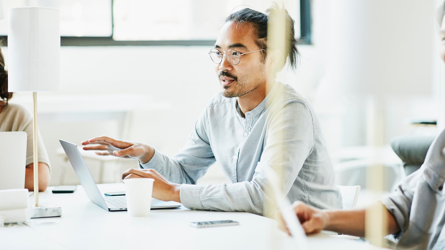 Industry professional in a meeting, BoF Careers 2022. Getty Images.